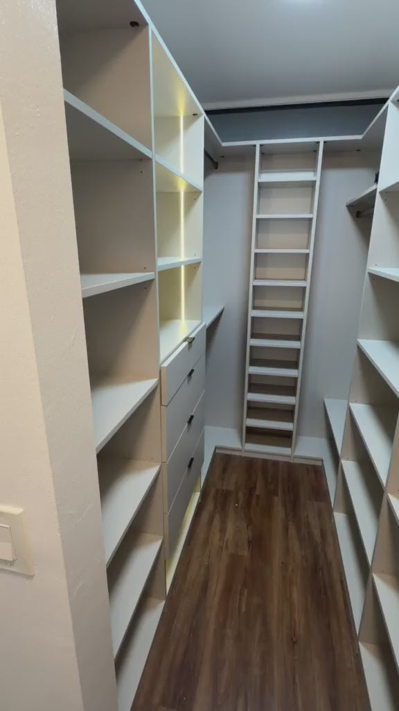 Video tour of a custom Cashmere Grey walk-in closet with LED lighting, drawers and shoe tower